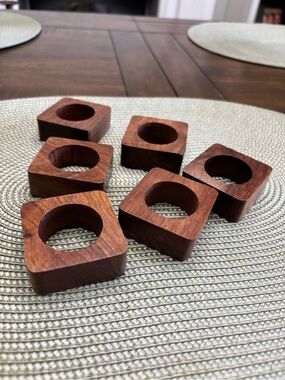Set of six solid wood square with round center napkin ring holders